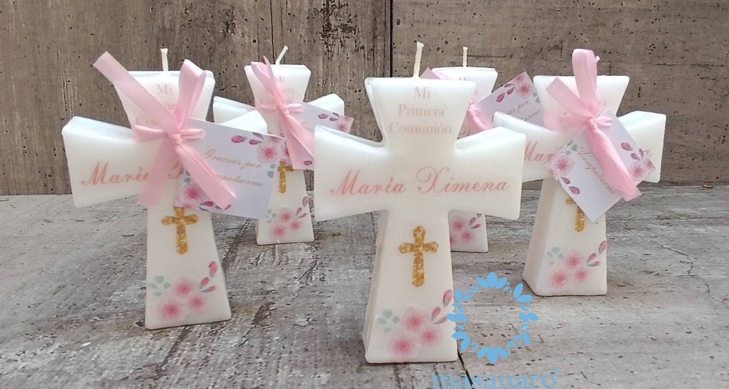 Velas de cruz flores rosas