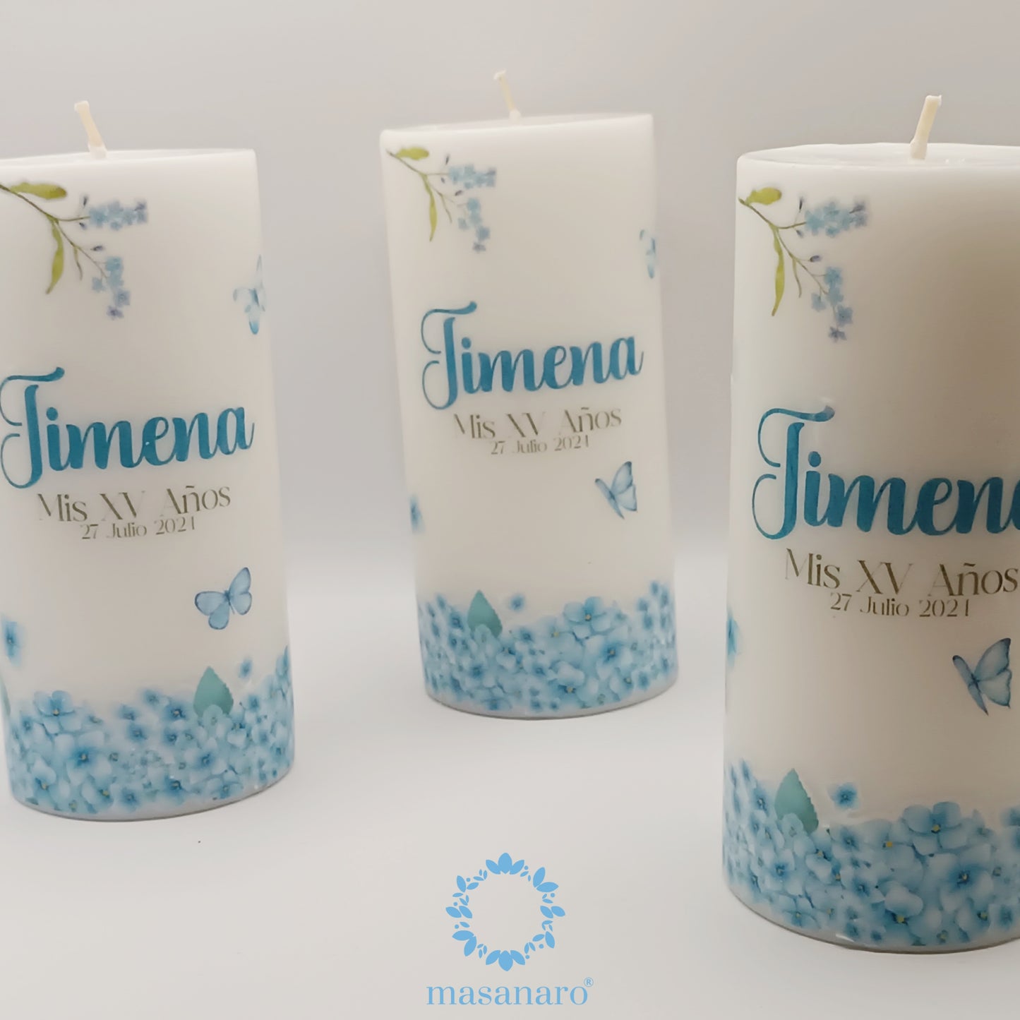 Paquete 10 velas. Diseño borde flores azules con mariposas