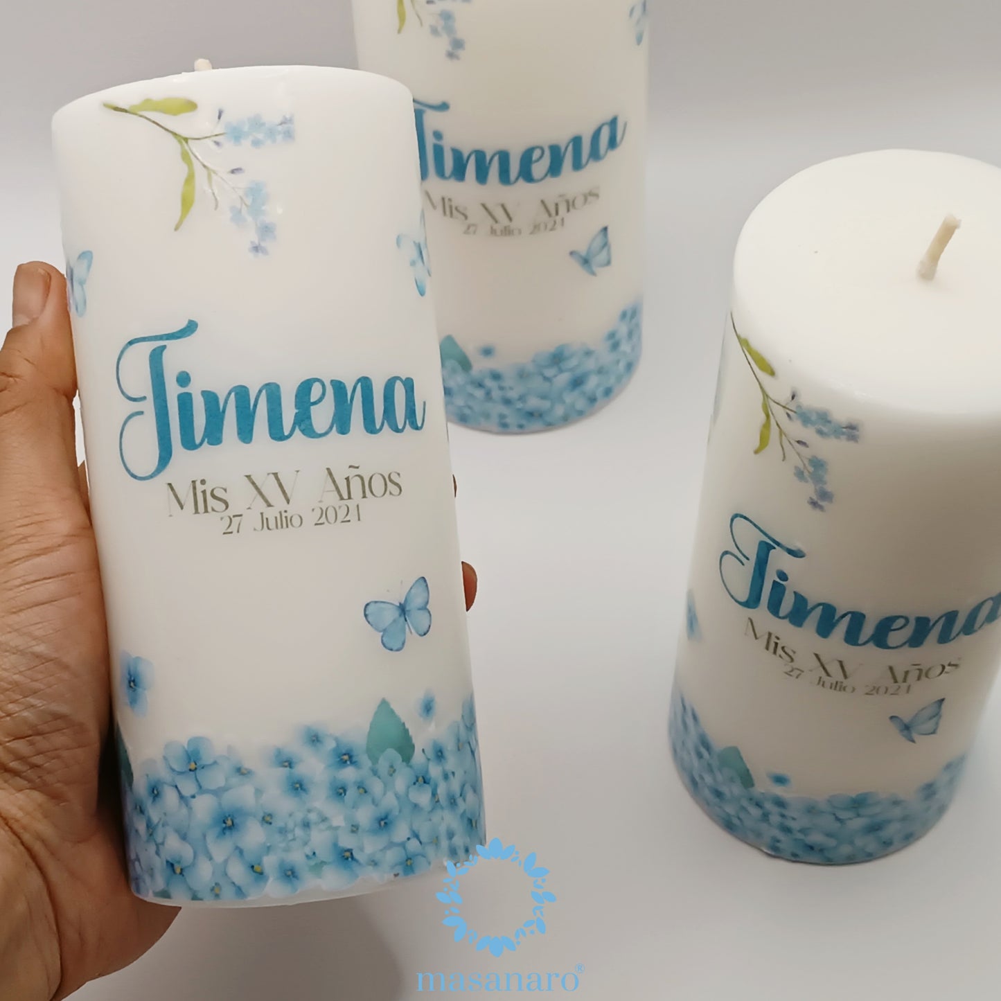 Paquete 10 velas. Diseño borde flores azules con mariposas