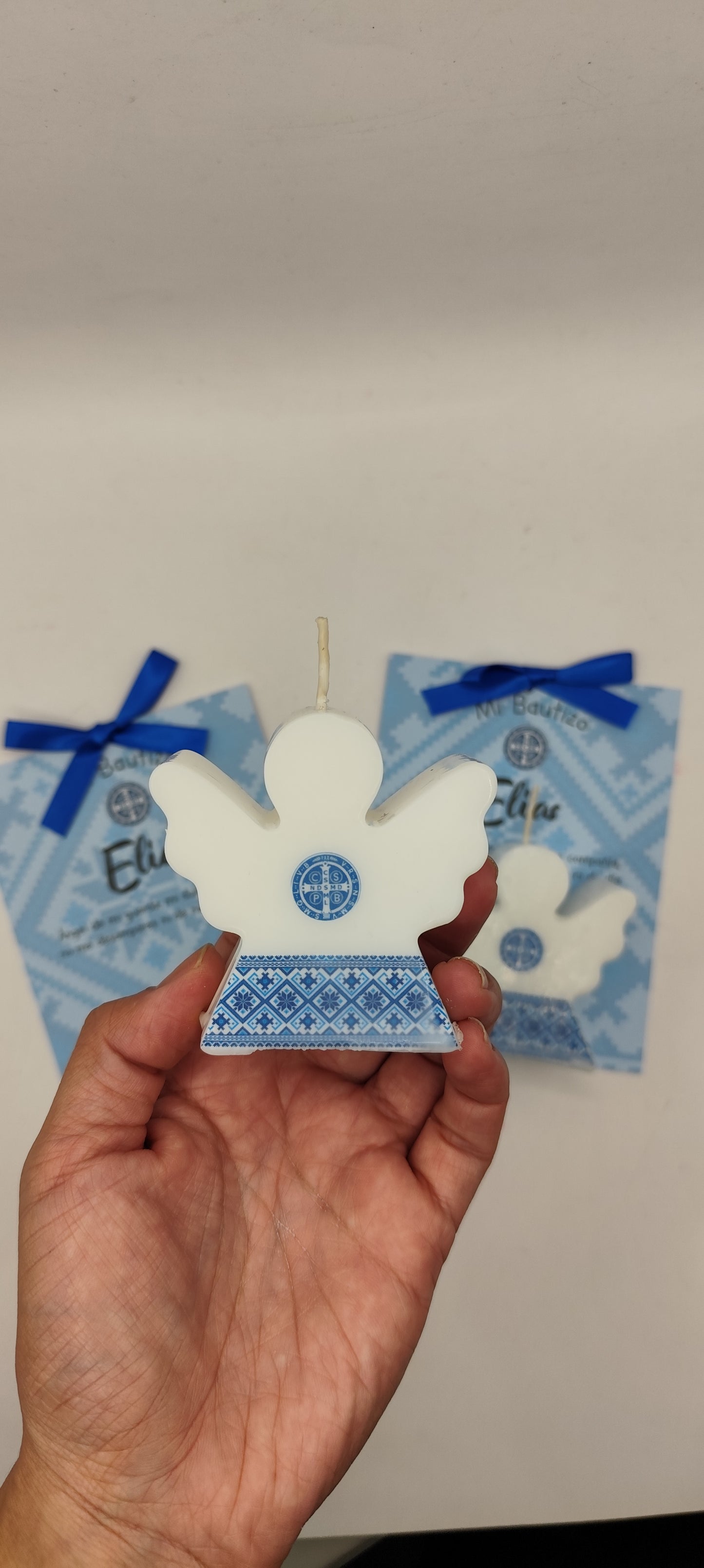 Paquete 10 velas de angelito. Diseño medalla San Benito
