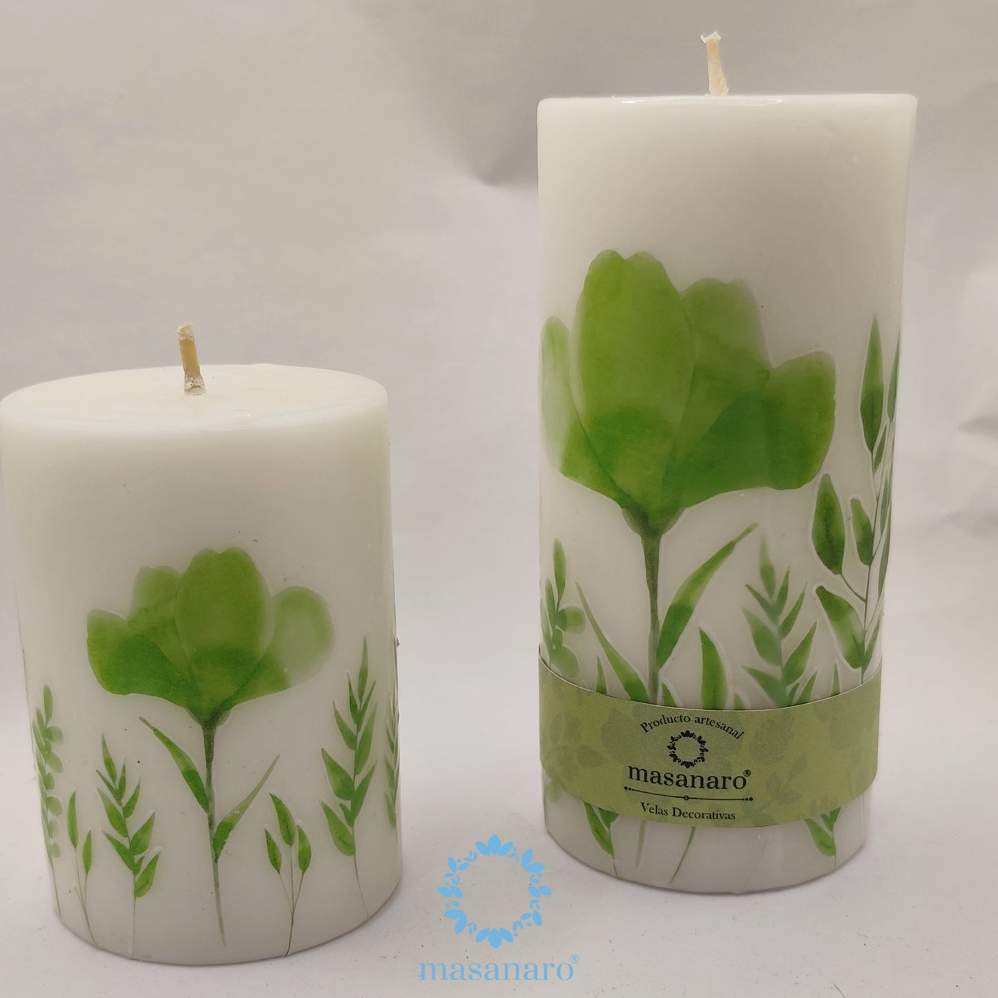Velas de cirio follaje verde