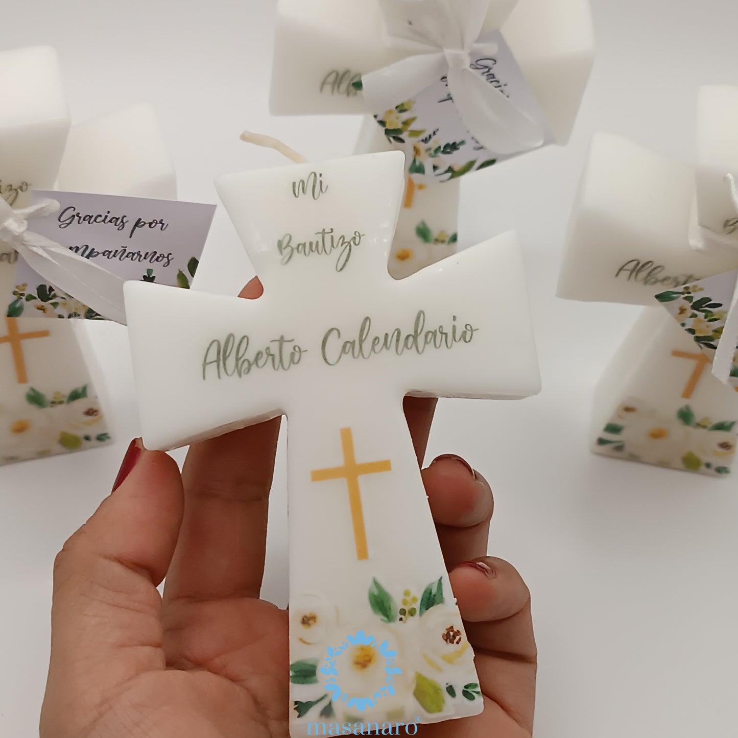 Paq. 10 velas de cruz. Mod. Flores blancas y verde