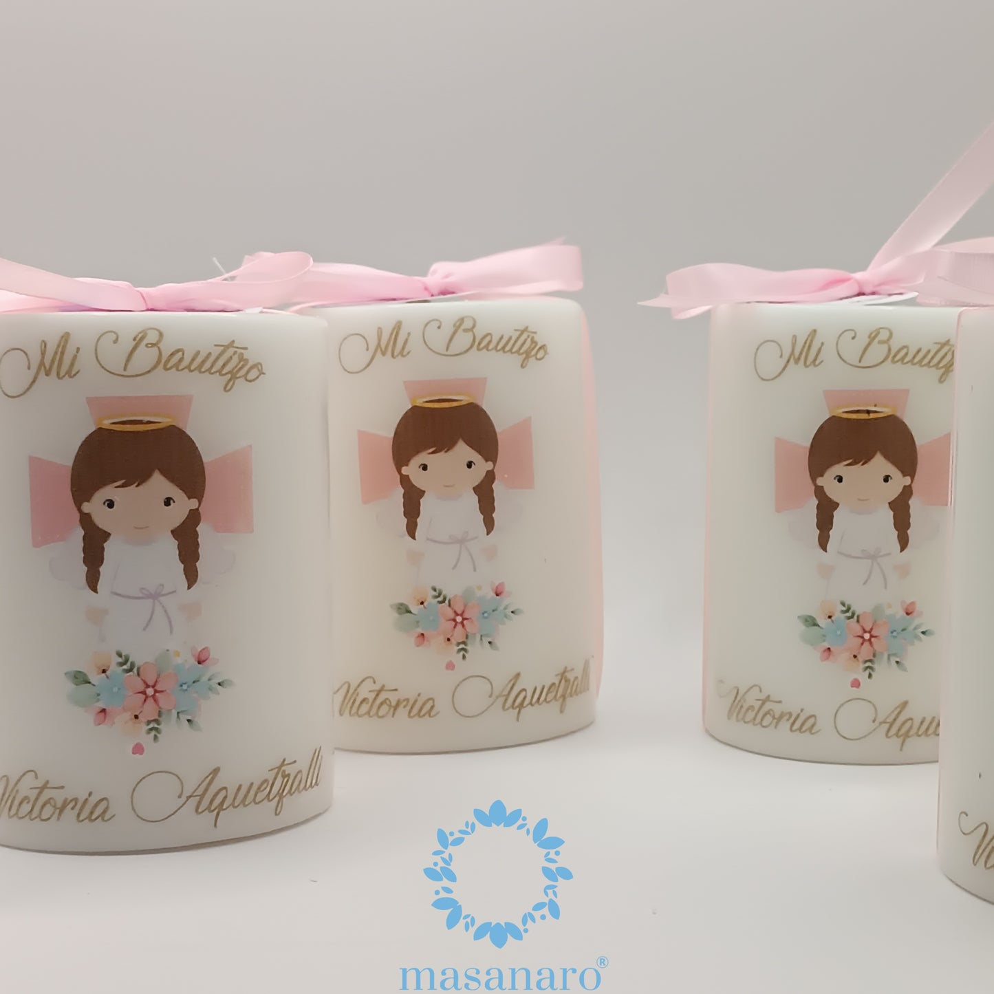 Vela con diseño de angel con cruz rosa