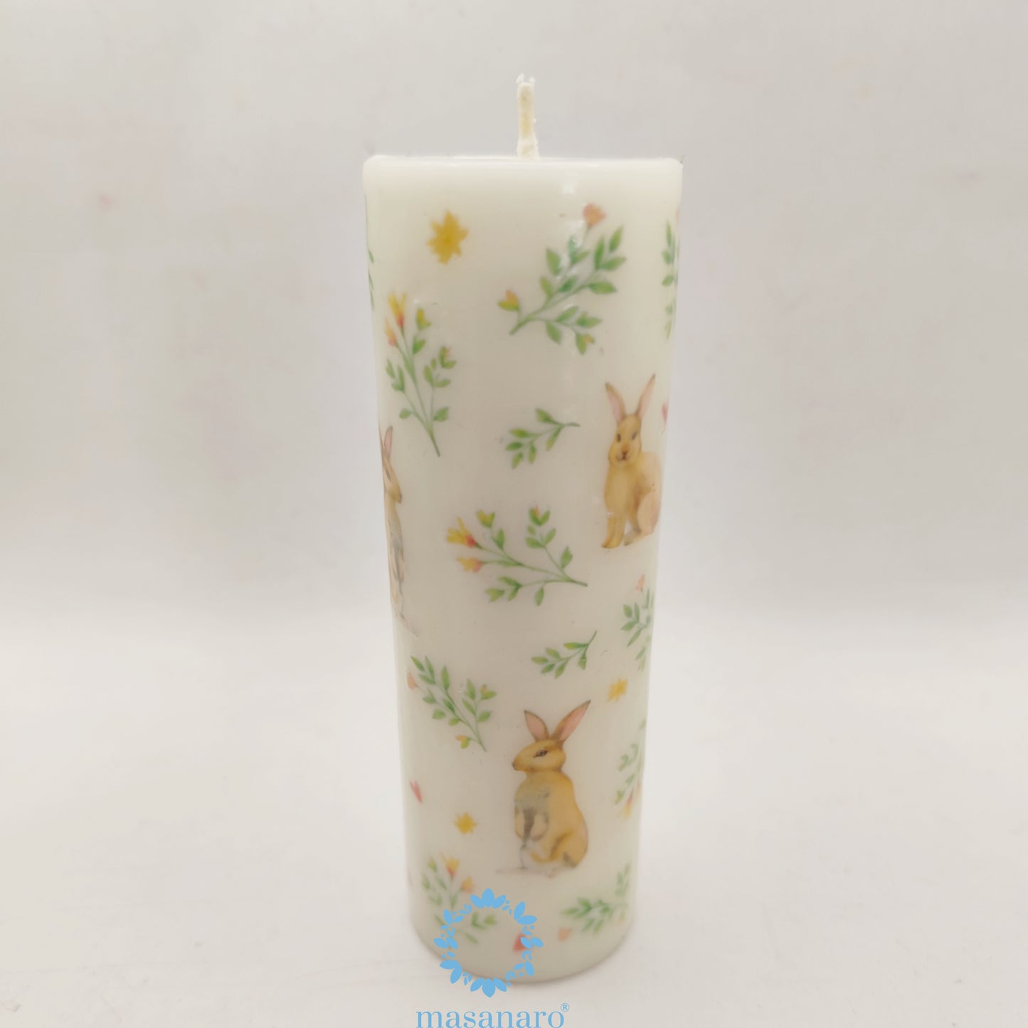 Vela con diseño conejos