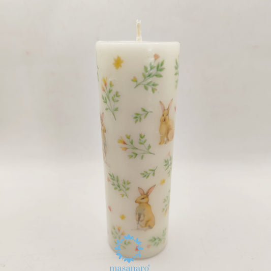 Vela con diseño conejos