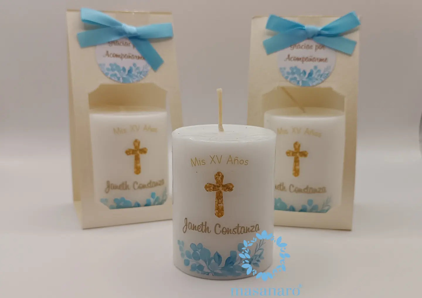 Vela con empaque de cartón. Diseño follaje azul