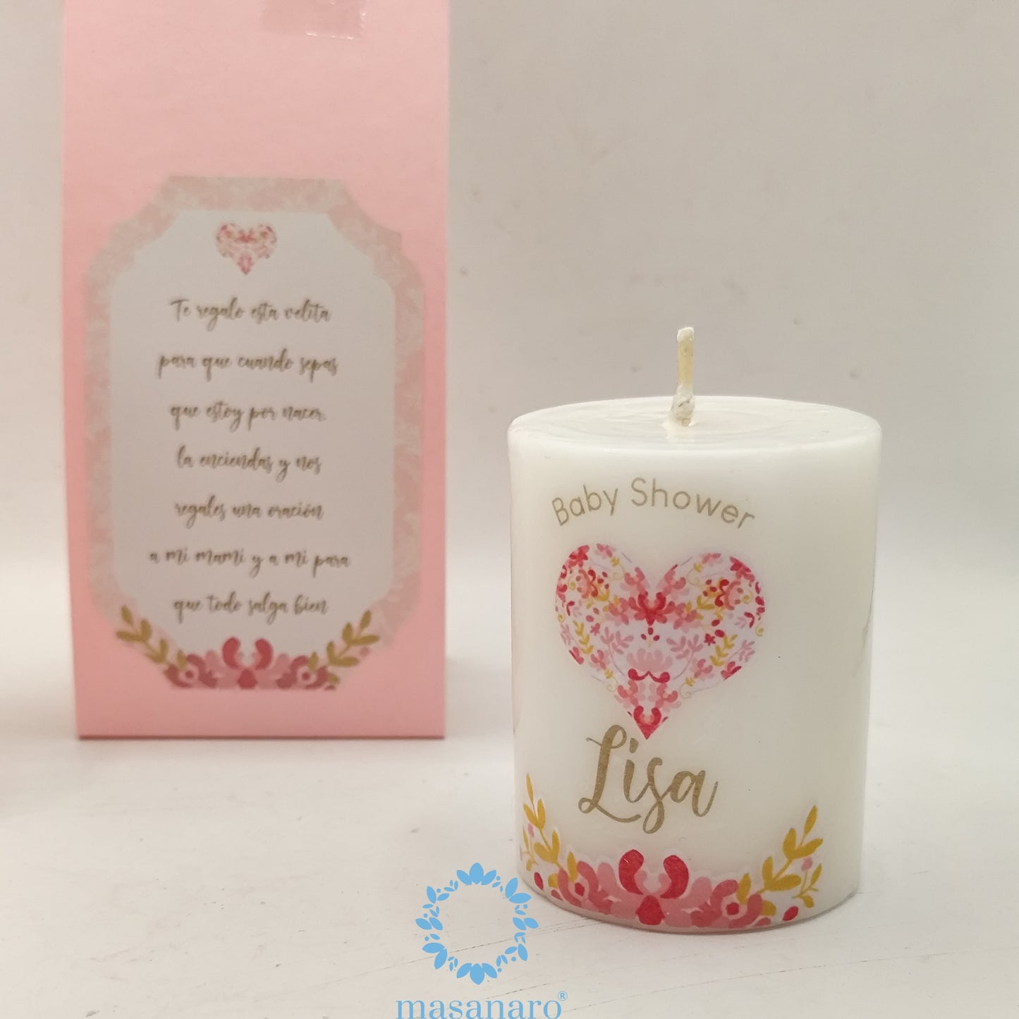 Vela con empaque de cartón. Diseño, corazón rosa