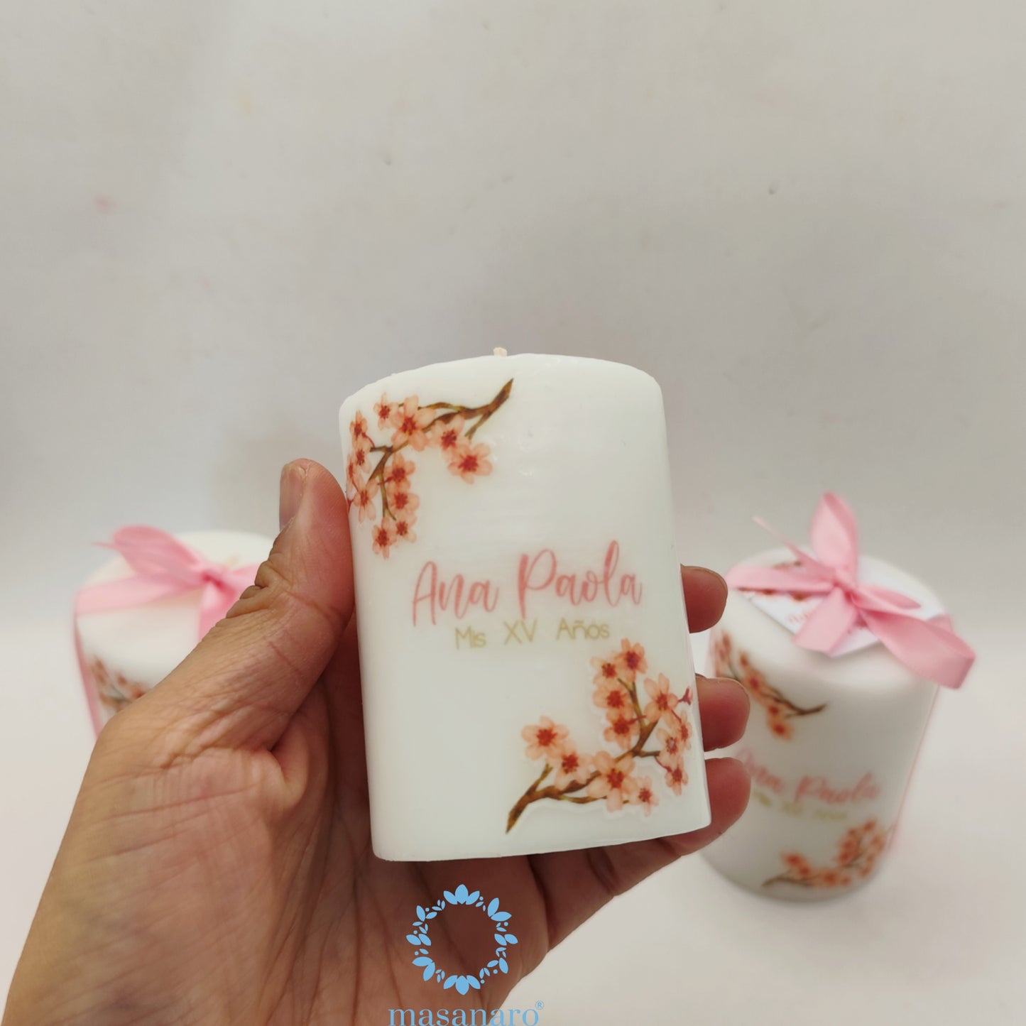 Vela con diseño de cerezos