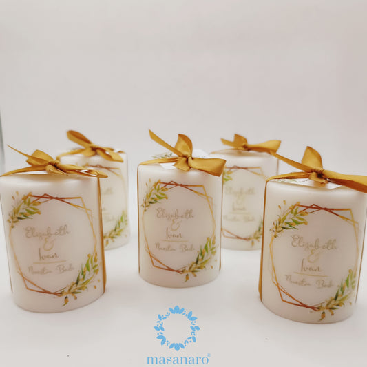 Vela con diseño hojas verdes