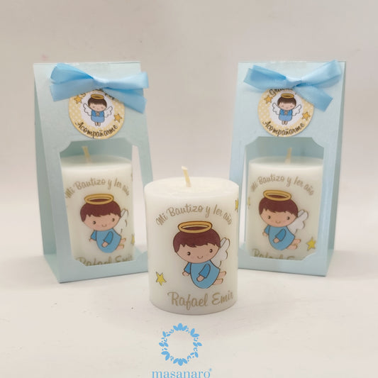 Vela con empaque de cartón. Diseño angelito