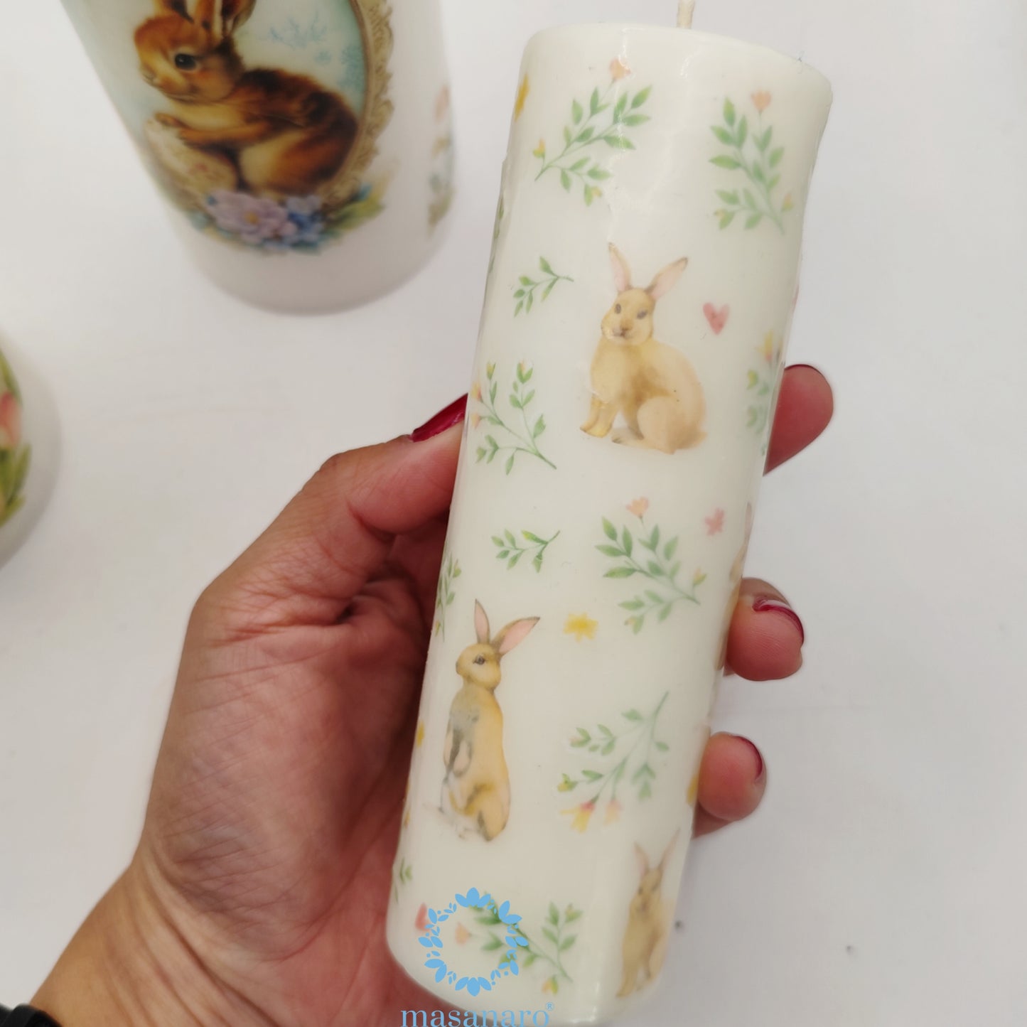 Vela con diseño conejos
