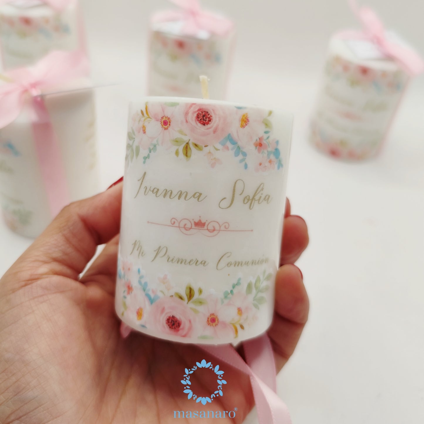 Vela con diseño flores rosas