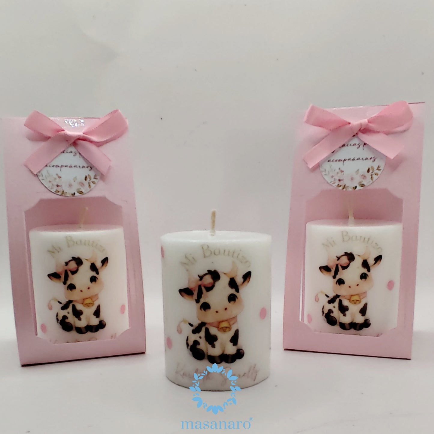 Vela con empaque de carton. Diseño de Vaquita