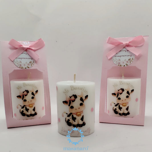 Vela con empaque de carton. Diseño de Vaquita