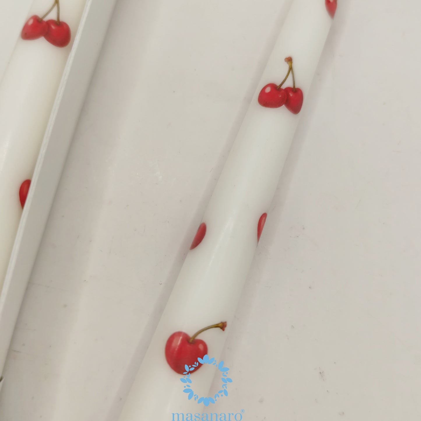 Paq. 2 velas taper. Diseño cerezas